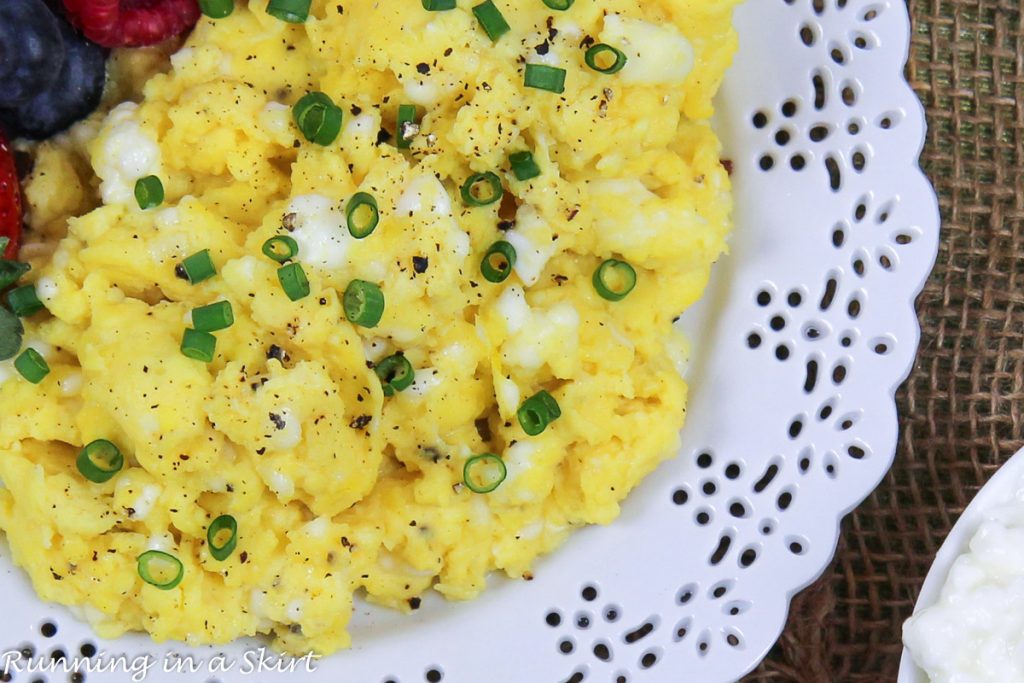 Scrambled Cottage Cheese Eggs on a white plate.