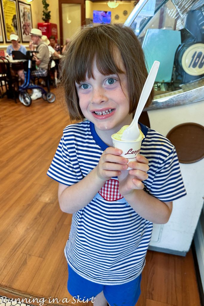 Boy holding Leopold's Ice Cream cup