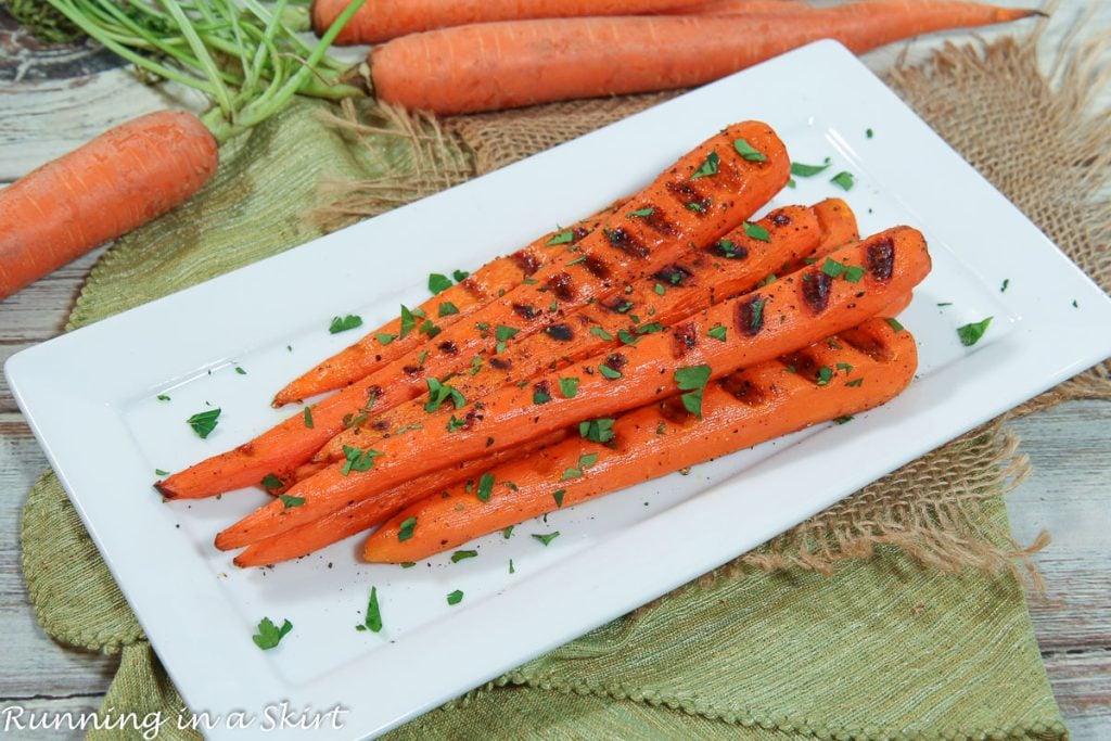 Grilled Carrots on a white plate.