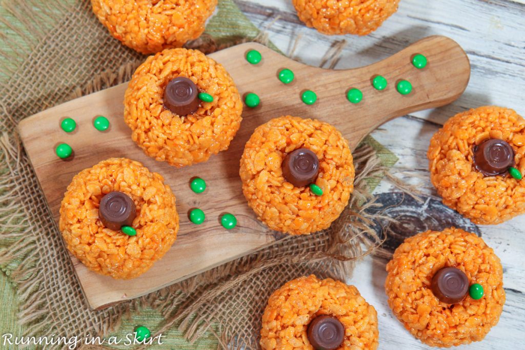 Overhead shot of Pumpkin Rice Krispie Treat on a cutting board.