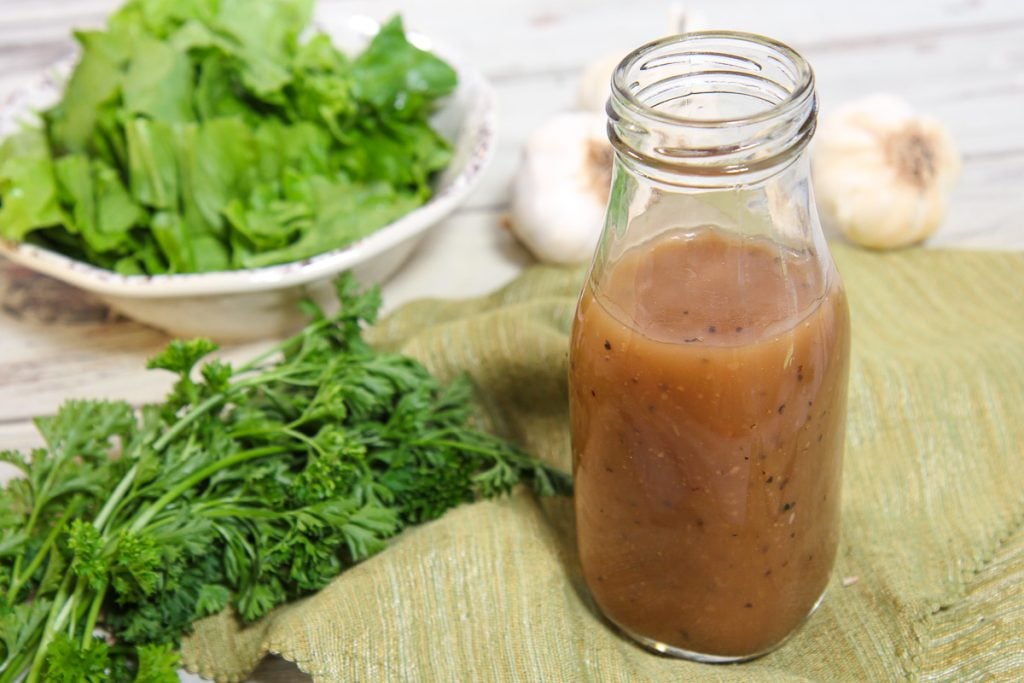 Creamy Balsamic Dressing in a glass jar.