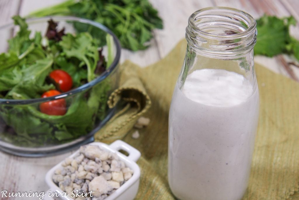 Healthy Blue Cheese Dressing recipe with salad bowl.